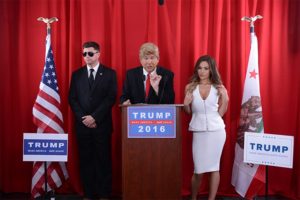 Donald Trump impersonator, along with porn star playing Melania Trump and extra as secret service in the Donald Trump VR Sex Tap Parody Press Conference