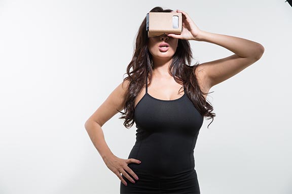 Anissa Kate wearing pair of google cardboard for BaDoinkVR shoot