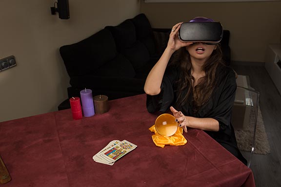 Virtual Reality Gear VR goggles gracing the head of Miriam Prado